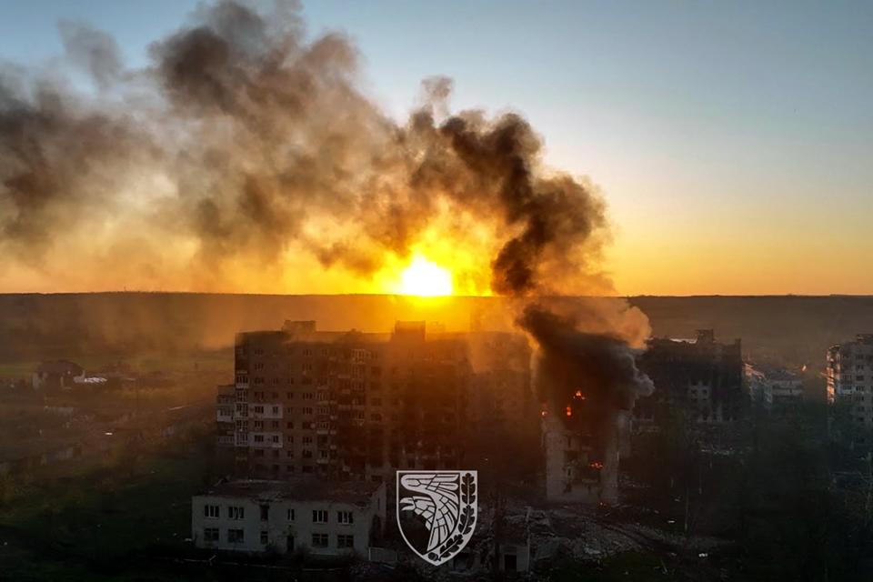 An apartment block on fire in Bakhmut (Armed Forces of Ukraine/AFP via)
