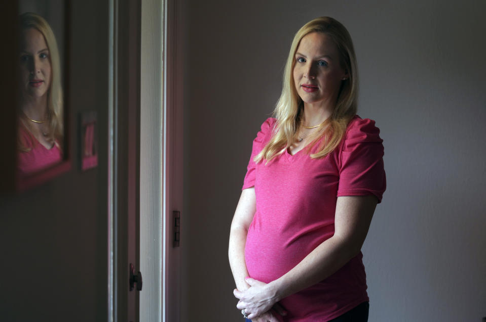 Dr. Austin Dennard poses for a photo at her home in Dallas, Thursday, May 18, 2023. (AP Photo/LM Otero)