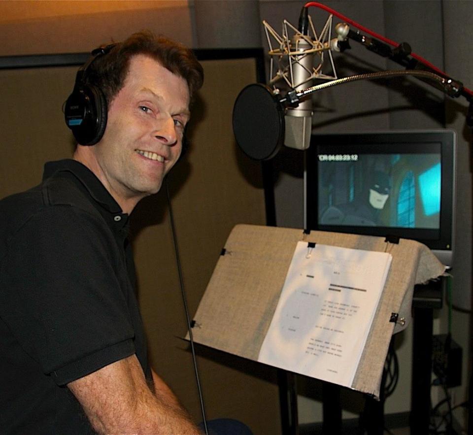 Kevin Conroy records an episode of 