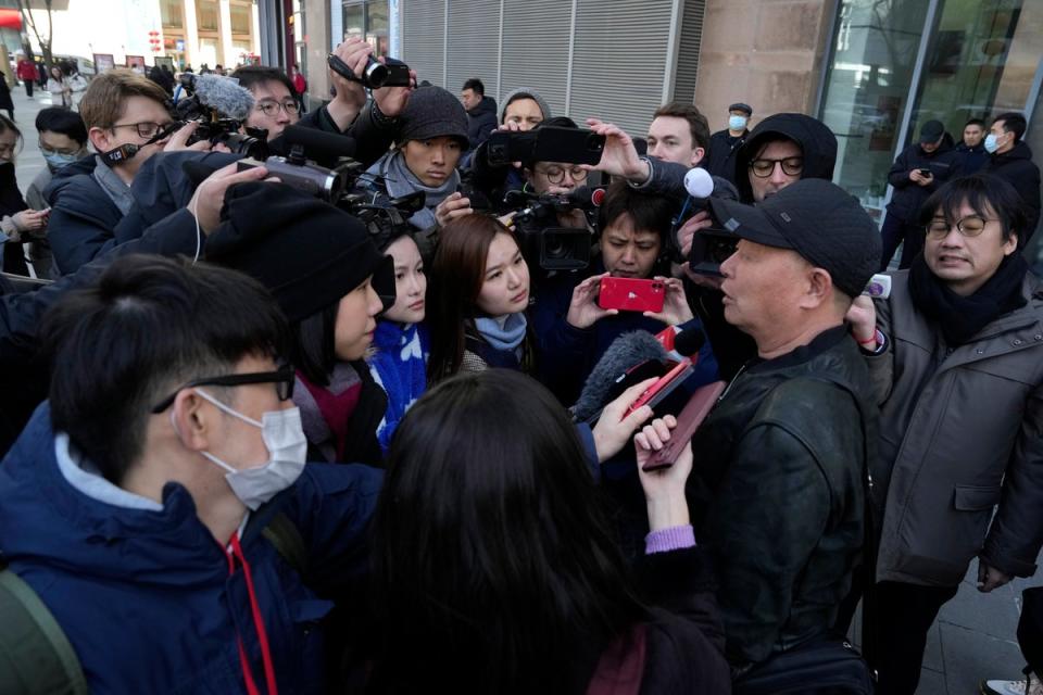 Li Shuce (bottom right) whose son was on missing Malaysia Airlines flight MH370 (Copyright 2024 The Associated Press. All rights reserved)