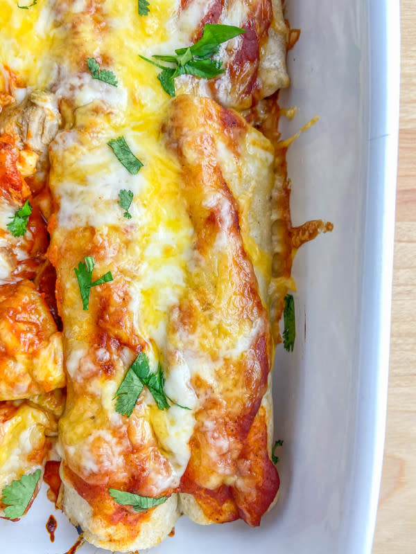 <p>Life Ambrosia</p><p>Tender pulled pork rolled in corn tortillas and topped with homemade enchilada sauce and two kinds of cheese.</p><p><strong>Get the recipe: <a href="https://www.lifesambrosia.com/pulled-pork-enchiladas-recipe/" rel="nofollow noopener" target="_blank" data-ylk="slk:Pulled Pork Enchiladas;elm:context_link;itc:0;sec:content-canvas" class="link rapid-noclick-resp">Pulled Pork Enchiladas</a></strong></p>
