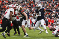 Auburn wide receiver Jay Fair (5) carries the ball after a reception against Western Kentucky during the first half of an NCAA college football game, Saturday, Nov. 19, 2022, in Auburn, Ala. (AP Photo/Butch Dill)