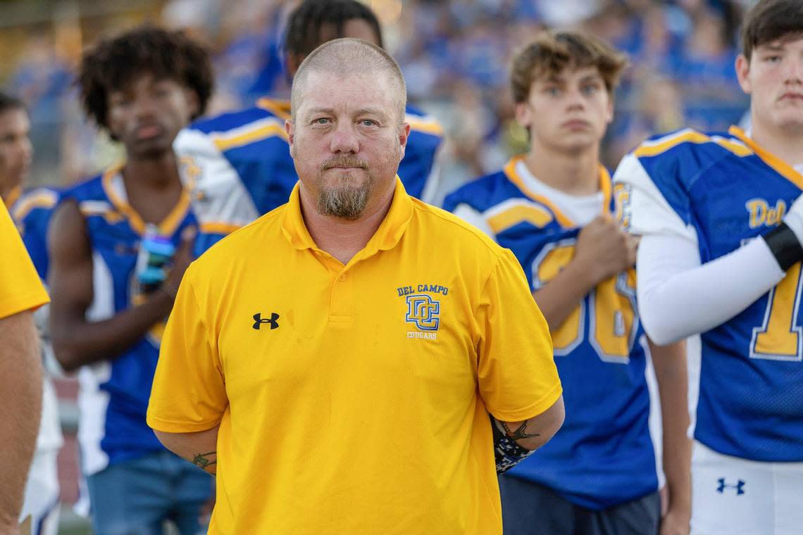 Del Campo coach Matt Costa stands on the sidelines before the game against the Bella Vista Broncos on Sept. 2 at Del Campo High School in Fair Oaks. His team had to forfeit the game, a 31--7 win on the field.