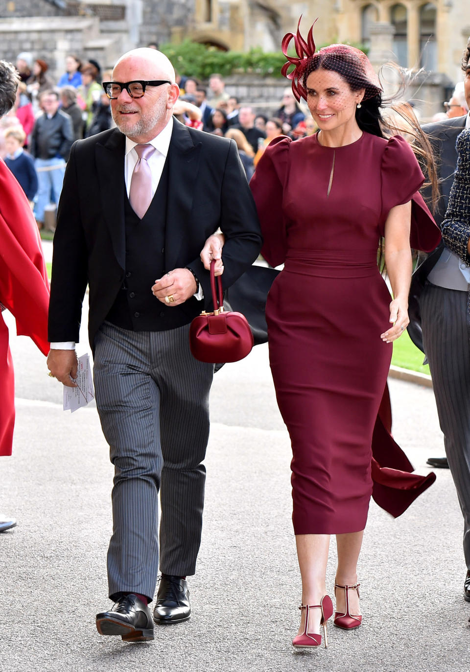 Demi Moore arrived in burgundy. (Photo: Getty Images)