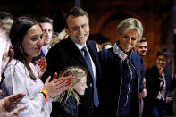 <p>French president-elect Emmanuel Macron celebrates on stage with wife Brigitte Trogneux during his victory rally near the Louvre museum in Paris, May 7, 2017. (Thomas Samson/Pool/Reuters) </p>