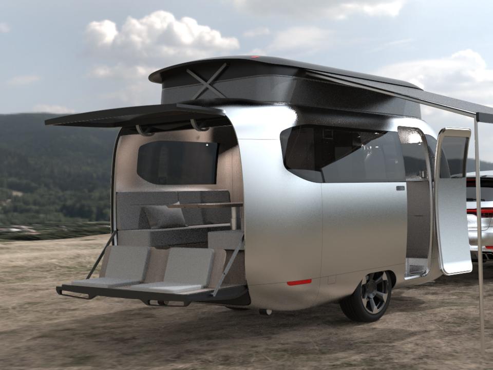 A rendering of the interior of the Airstream Studio F. A. Porsche Concept Travel Trailer next to a vehicle.