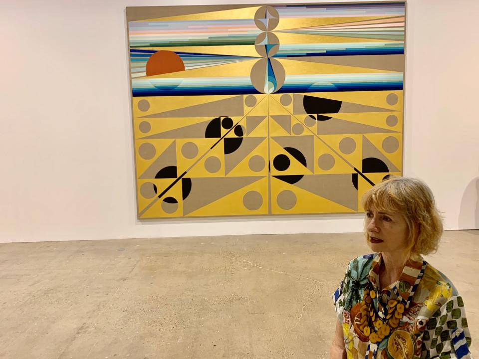 Annette Carlozzi contemplates a chapel-like room with six very large pieces by Eamon Ore-Giron at The Contemporary Austin-Jones Center downtown.