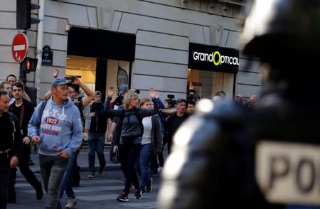 Protesters attend a demonstration on Act 45 (the 45th consecutive national protest on Saturday) of the yellow vests movement in Paris