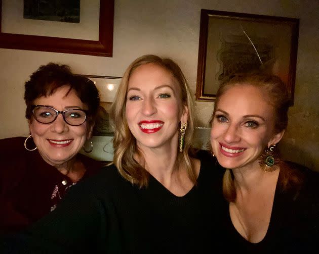 The author (center) with her mom and sister at dinner in Denver, about a year and a half after her mom left rehab. (Photo: Courtesy of Kristin Fasy)