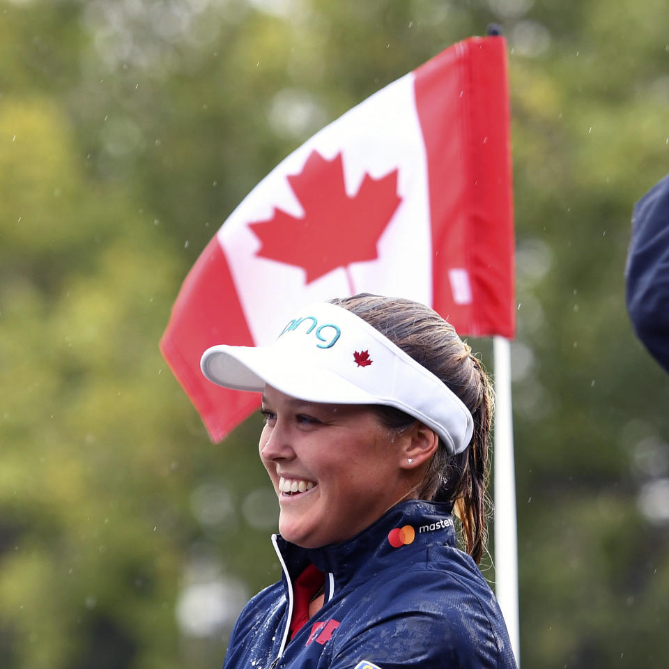 Canada's Brooke Henderson smiles after winning the Women's Canadian Open golf tournament in Regina, Saskatchewan, Sunday Aug. 26, 2018. (Jonathan Hayward/The Canadian Press via AP)