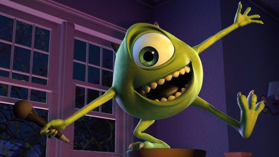 Mike Wazowski stands for applause and laughter in Monsters Inc