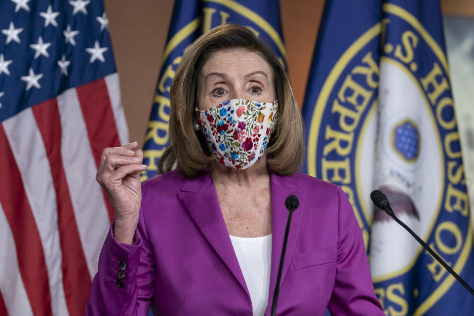 Speaker of the House Nancy Pelosi, D-Calif., holds a news conference on the day after violent protesters loyal to President Donald Trump stormed the U.S. Congress, at the Capitol in Washington, Thursday, Jan. 7, 2021. (AP Photo/J. Scott Applewhite)