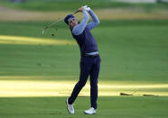 Justin Thomas hits his second shot on the 15th hole during the Genesis Invitational pro-am golf event at Riviera Country Club, Wednesday, Feb. 17, 2021, in the Pacific Palisades area of Los Angeles. (AP Photo/Ryan Kang)