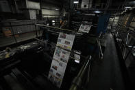 An edition of the Butler Eagle newspaper is run through the press, Thursday, July 18, 2024, in Butler, Pa. (AP Photo/Matt Slocum)