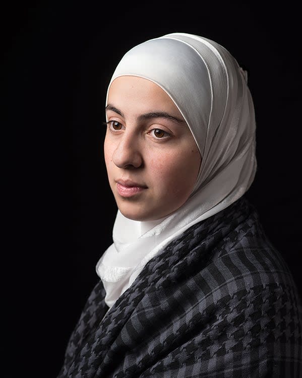 Hala, a Syrian refugee, used to panic when planes flew overhead in Montreal. She lived in fear for her family back home. Montreal, Nov 27, 2013.