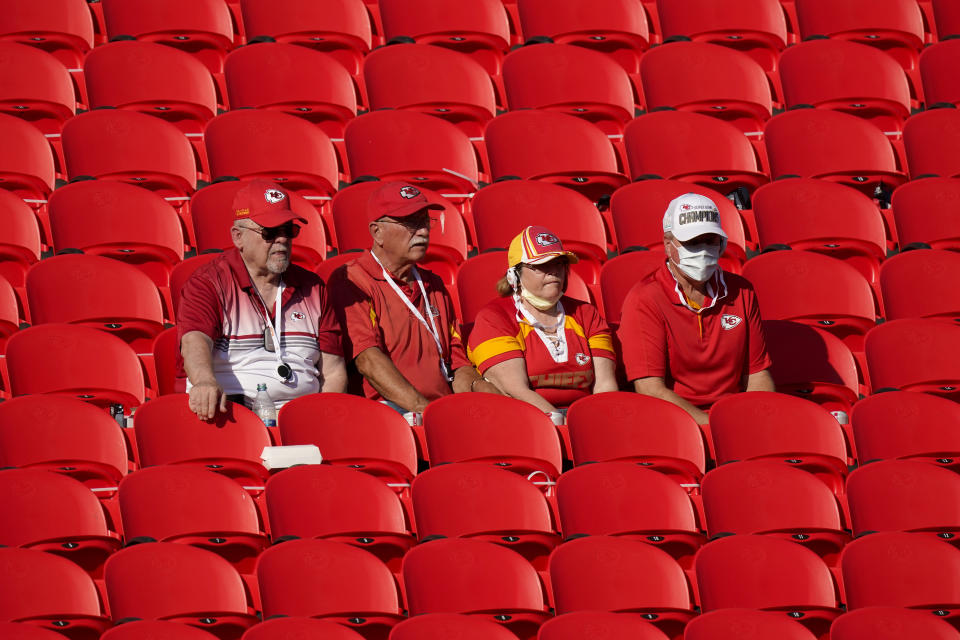 Fans watch the Kansas City Chiefs during an NFL football training camp Saturday, Aug. 22, 2020, at Arrowhead Stadium in Kansas City, Mo. The Chiefs opened the stadium to 2,000 season ticket holders to watch practice as the team plans to open the regular season with a reduced capacity of approximately 22 percent or normal. (AP Photo/Charlie Riedel)