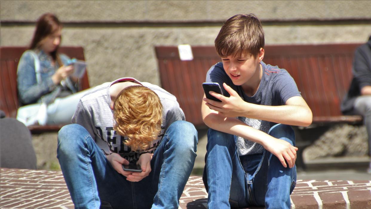  Kids on Phones. 