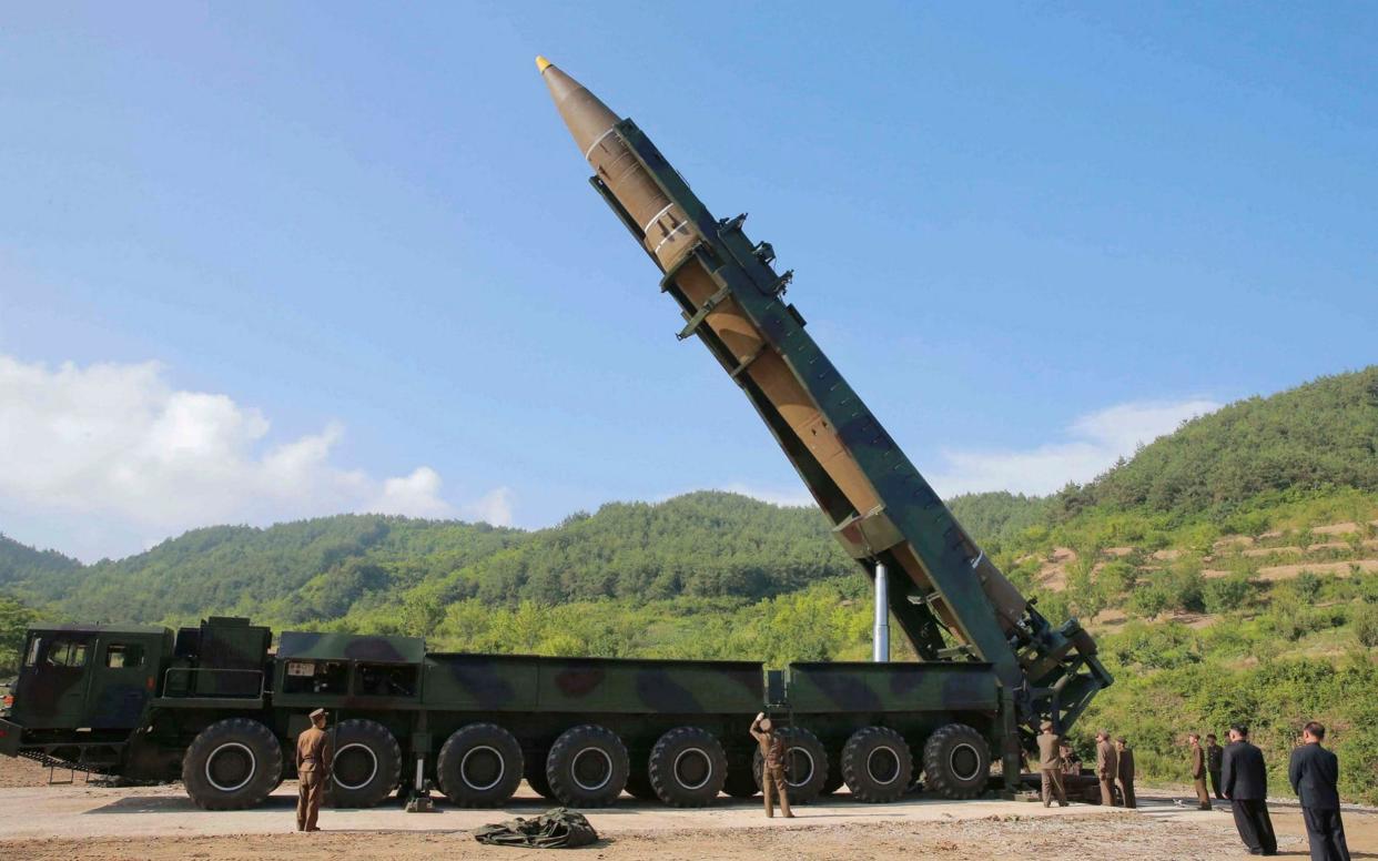 Kim Jong-un inspects an intercontinental ballistic missile in 2017 - KCNA via KNS