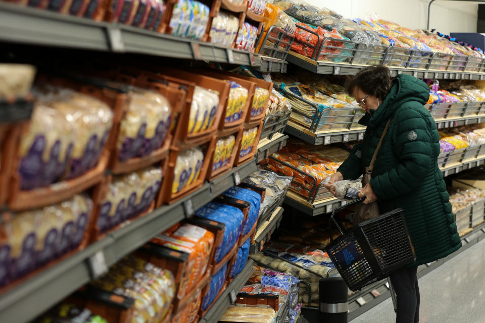 LONDON, UNITED KINGDOM - 2021/11/05: A shopper seen in Aldi supermarket. According to a research from Which? (A company that promotes informed consumer choice in the purchase of goods and services), Aldi has been named as the cheapest supermarket in the UK for the second month running, beating its rival Lidl. Which? found a basket of 23 items from Aldi cost £24.24 on average in October 2021, compared to £24.97 at Lidl. (Photo by Dinendra Haria/SOPA Images/LightRocket via Getty Images)