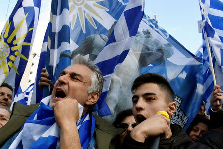 FILE PHOTO: Protesters shout slogans during a demonstration against the agreement reached by Greece and Macedonia to resolve a dispute over the former Yugoslav republic's name, in Athens, Greece, January 20, 2019. REUTERS/Alexandros Avramidis/File Photo