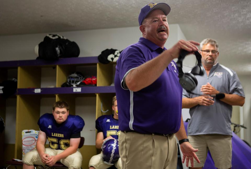 Millersport Head Coach Jack Treinish talks to his players in the locker room before the start of game as the Lakers took on the Miller Falcons in high school football at Millersport High School in Millersport, Ohio on September 18, 2021. This was the first time the Lakers were playing football at their home field since 2017.