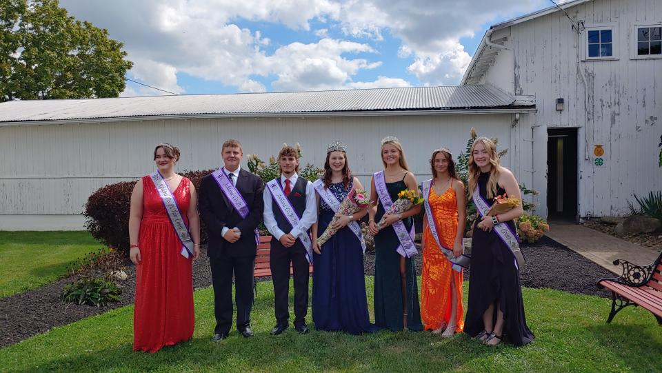Members of the Ashland County Fair royal court are Scarlett Wilhelm, left, Connor Mellor, King Reed Twining, Queen Baylee Weber, Sage Runion, Kendall Ramey and Alexus Evans.