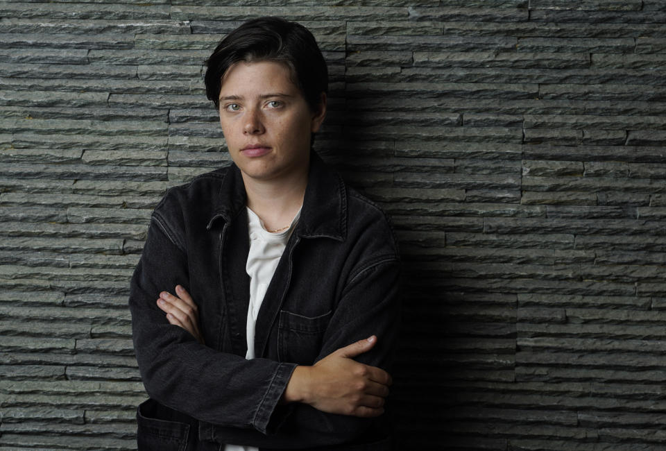 Writer-director Charlotte Wells poses for a portrait at Mother Tongue restaurant in Toronto to promote the film "Aftersun," during the 2022 Toronto International Film Festival on Sept. 12, 2022. (AP Photo/Chris Pizzello)