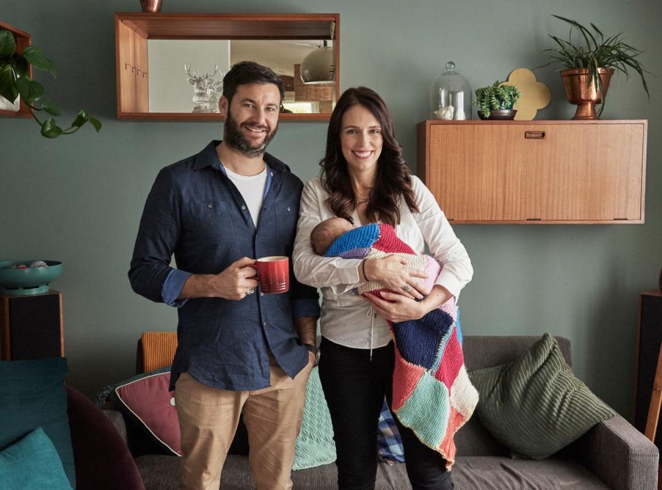 Jacinda Ardern with partner Clarke Gayford and their baby daughter Neve in their home in Auckland (AP)