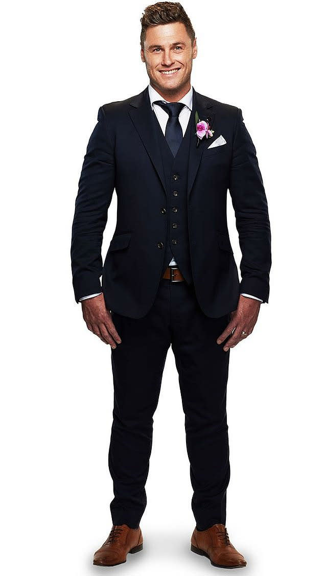 MAFS groom Chris in three piece suit with pink button hole