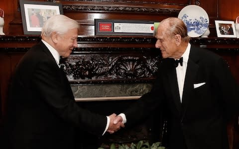 Prince Philip and Sir David Attenborough meet at a 2015 screening of a TV series on the Great Barrier Reef - Credit: Getty