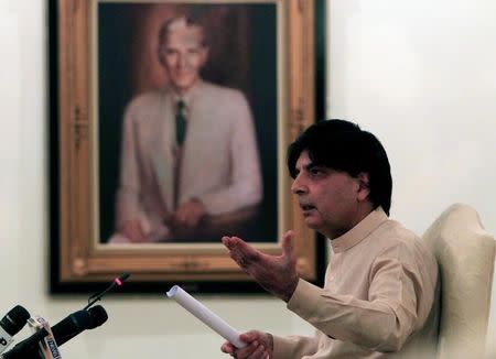 Pakistan's Interior Minister Chaudhry Nisar Ali Khan attends a news conference in Islamabad, Pakistan, May 24, 2016. A picture of Mohammad Ali Jinnah, founder and first governor-general of Pakistan, hangs on the wall. REUTERS/Faisal Mahmood/Files