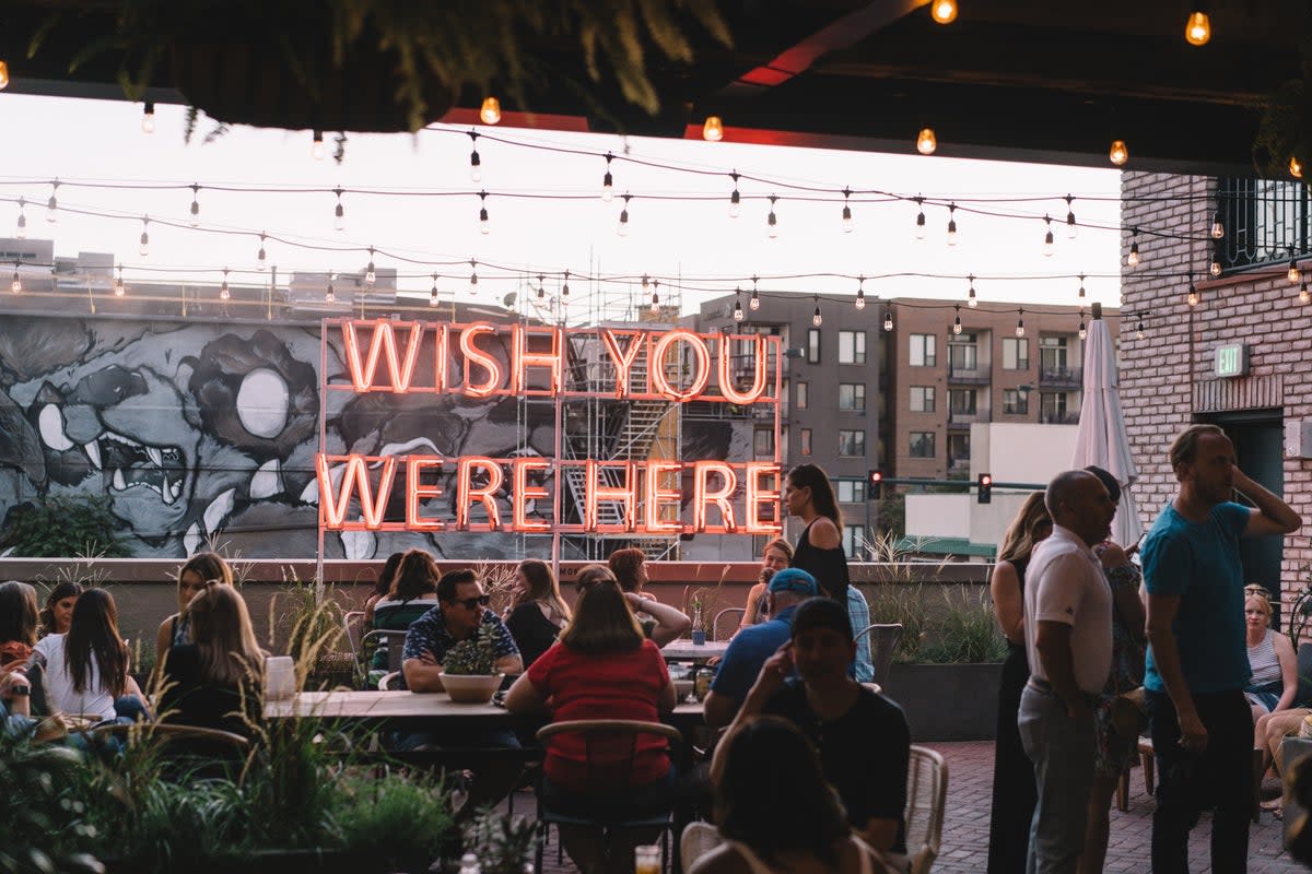 The Garden’s neon ‘Wish you were here’ sign is a perfect backdrop for an Instagram post (The Ramble Hotel)