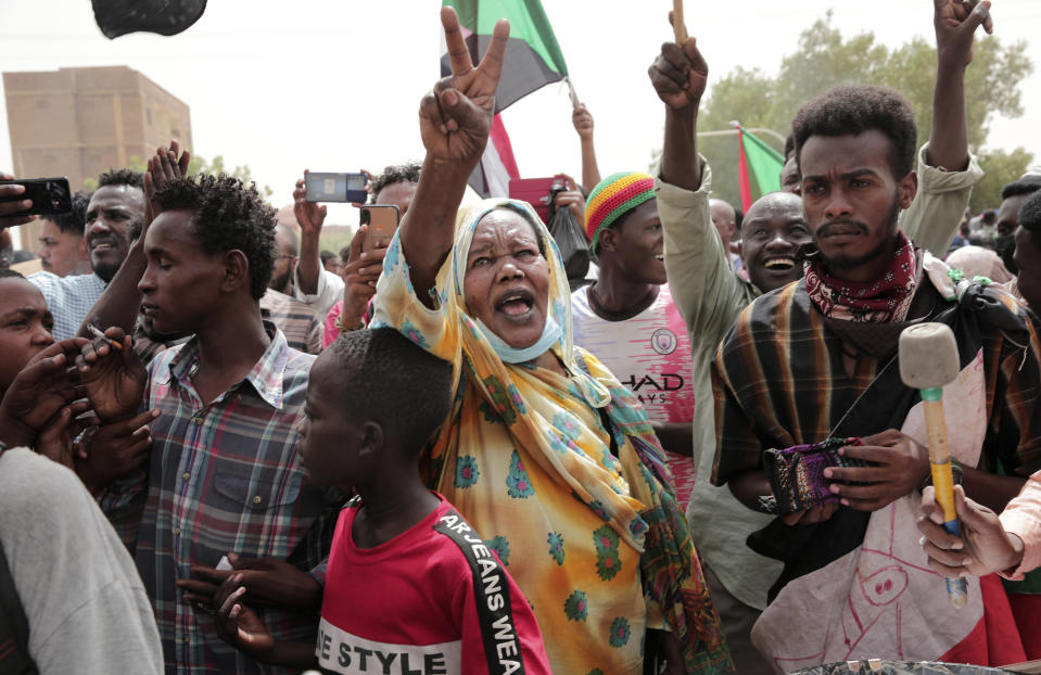 Sudanese protesters commemorate the third anniversary of a deadly crackdown carried out by security forces on protesters during a sit-in outside the army headquarters, in Khartoum, Sudan, Friday, June 3, 2022. Talks aiming at ending Sudan’s ongoing political deadlock began Wednesday, June 8, 2022, the United Nations said, although the country's main pro-democracy alliance is boycotting them over a continued police crackdown on those protesting last October's military coup. (AP Photo/ Marwan Ali)