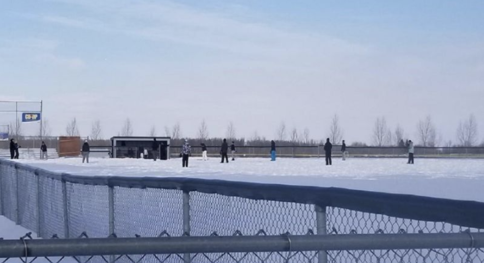 This photo shows a group of athletes playing a snow-filled game of baseball in Leduc, Alta. The image was posted on Reddit on Monday. Photo from <a href="https://www.reddit.com/r/Torontobluejays/comments/art3hc/they_were_playing_baseball_in_leduc_just_outside/?sort=new" rel="nofollow noopener" target="_blank" data-ylk="slk:Reddit;elm:context_link;itc:0;sec:content-canvas" class="link ">Reddit</a> .