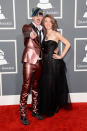 Josh Ramsay (L) and Amanda McEwan arrive at the 55th Annual Grammy Awards at the Staples Center in Los Angeles, CA on February 10, 2013.