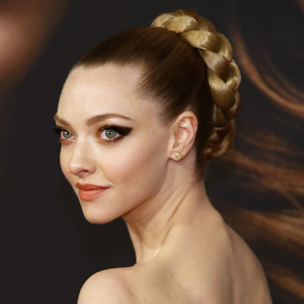 <b>Celebrities in plaits: Amanda Seyfried</b><br><br>The Les Mis actress looks stunning in a plaited up-do with the rest of her tresses slicked back.<br><br>© Rex