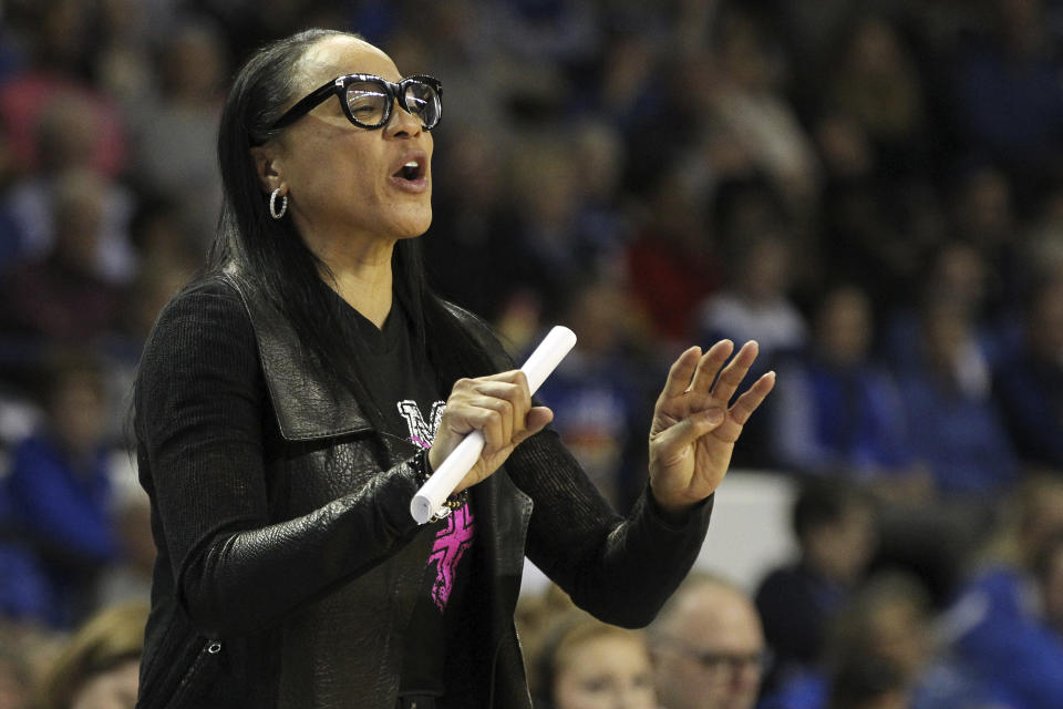 South Carolina head coach Dawn Staley directs her team during the second half of an NCAA college basketball game against Kentucky in Lexington, Ky., Sunday, Feb. 23, 2020. (AP Photo/James Crisp)