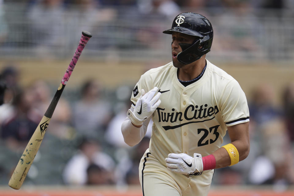 Minnesota Twins' Royce Lewis (23) flips his bat after hitting a two-run home run during the sixth inning of a baseball game against the Colorado Rockies, Wednesday, June 12, 2024, in Minneapolis. (AP Photo/Abbie Parr)