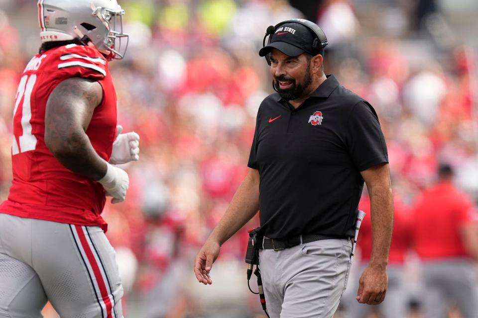 Aug 31, 2024; Columbus, OH, USA; Ohio State Buckeyes head coach Ryan Day walks onto the field during the first half of the NCAA football game against the Akron Zips at Ohio Stadium.