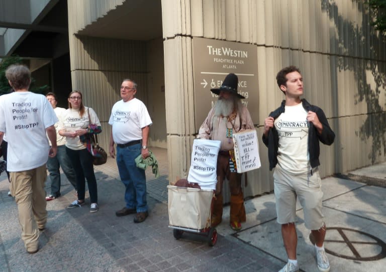 Demonstrators protest in Atlanta, Georgia, where trade ministers from the US, Japan and 10 other Pacific Rim countries are trying to negotiate a final agreement on the Trans-Pacific Partnership trade agreement, on September 30, 2015