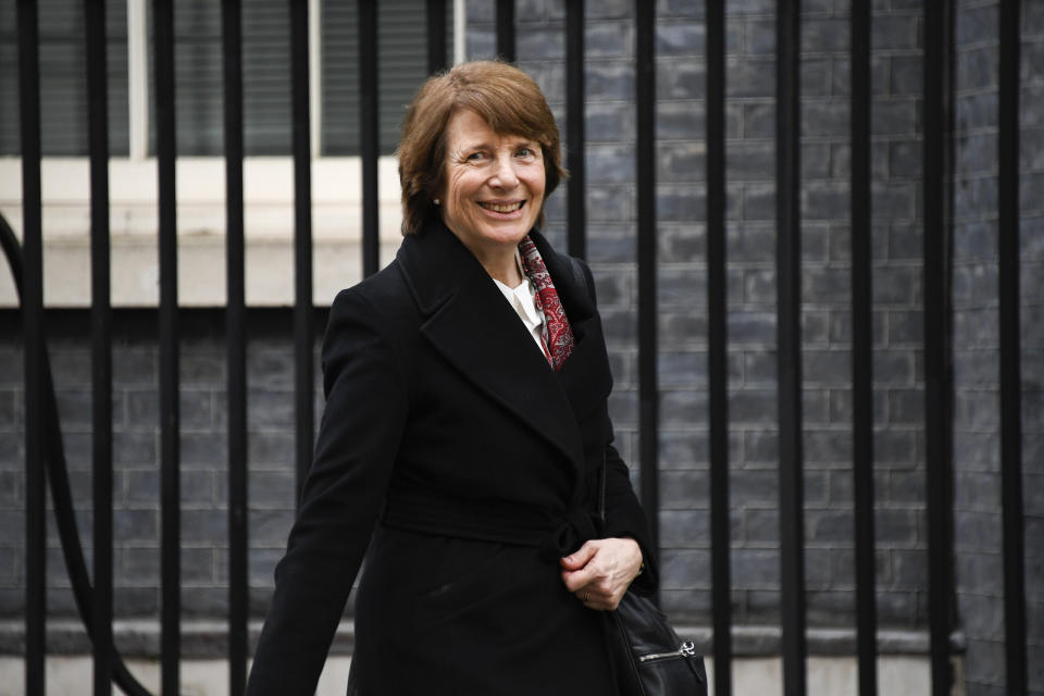 June Raine, head of the Medicines and Healthcare Products Regulatory Agency (MHRA) leaves 10 Downing Street after attending a press conference on AstraZeneca Plc and the University of Oxford vaccine, in London, Wednesday, Dec. 30, 2020.(AP Photo/Alberto Pezzali)