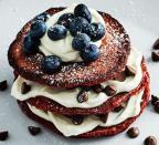 <p>Erm, these are a must this Pancake Day.<br><br> Inspired by New York diners, these vegetarian red velvet pancakes will go down a treat on Tuesday. Make sure to check out the <a rel="nofollow noopener" href="https://www.bbcgoodfood.com/recipes/red-velvet-pancakes" target="_blank" data-ylk="slk:recipe;elm:context_link;itc:0" class="link ">recipe</a> (before we do).<br><br><b>Ingredients:</b><br> 180g self raising flour<br> 2 tbsp cocoa powder<br> 1 tsp baking powder<br> 1 tbsp golden caster sugar<br> ½ tsp vanilla extract<br> 200ml milk<br> 3 eggs<br> 25g butter<br> Red food colouring<br>To serve: 100g cream cheese, 4 tbsp maple syrup, 100g chocolate chips, icing sugar for dusting, handful of blueberries </p>
