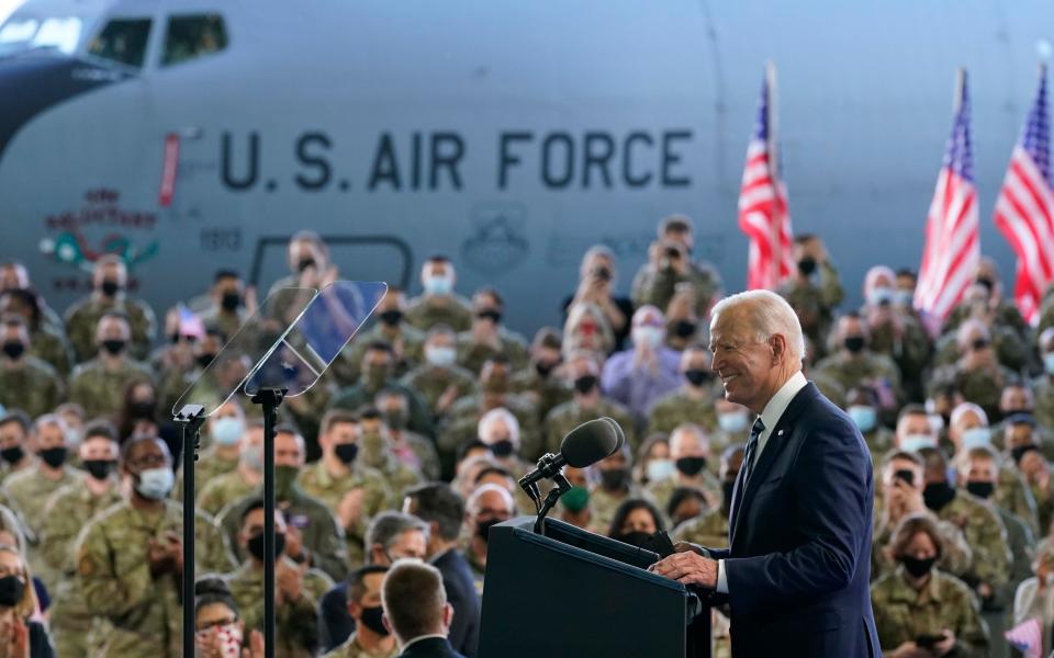 President Joe Biden speaks to American service members at RAF Mildenhall in Suffolk - Patrick Semansky /AP