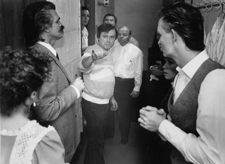 Director Marion Waggoner, center, gives "The Passion of Dracula" cast a pep talk before Monday night's rehearsal in the Majestic Theater. Clockwise, from left, are Ellen Doerres, Philo Dickey, Joni Hough, Mike Ziogas, Tom Casstor, Amy Lake and David Moore.