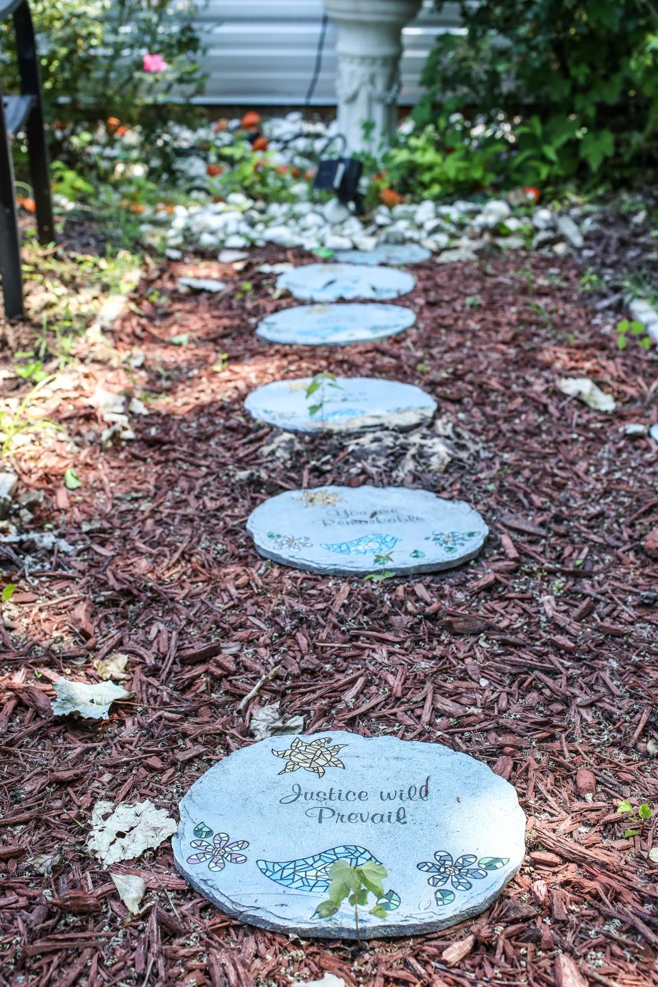 Rose Smith had these pavers made in the garden behind the Ace Project community center in west Louisville. June 14, 2024