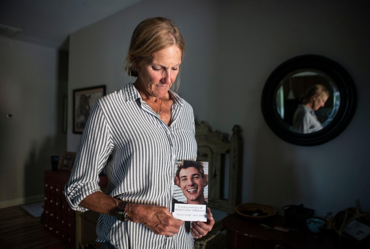 Julie Hofmans holds a photo of her late son Wyatt Williamson, who died from a laced pill which contained fentanyl in 2020. Wyatt took a blue pill he thought was Xanax. Instead of the legal prescribed medication for anxiety, he swallowed a pill secretly poisoned with deadly fentanyl.