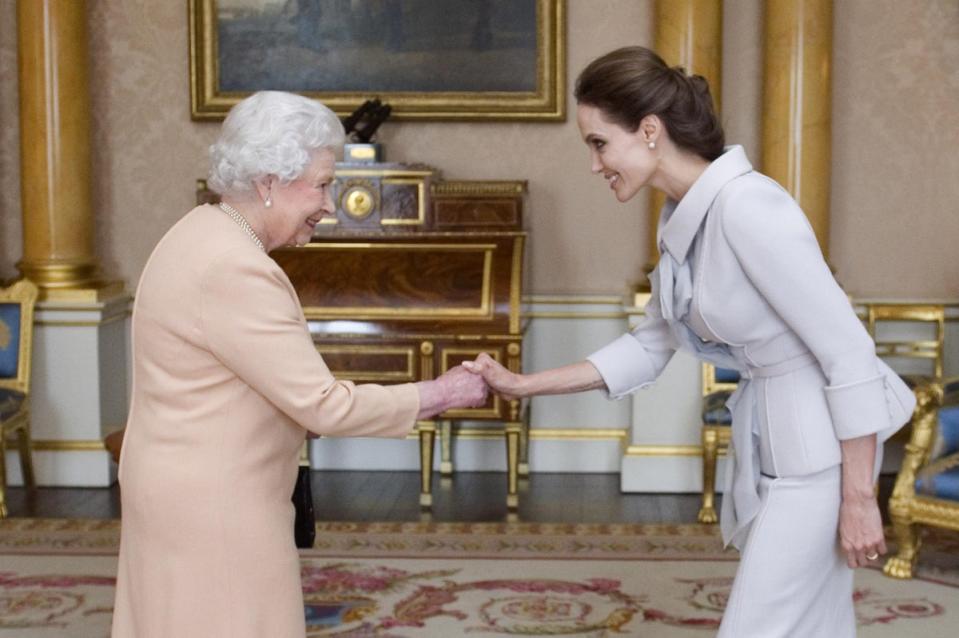 Angelina Jolie: Actor Angelina Jolie is presented with an honorary damehood for her services to UK foreign policy and the campaign to end war zone sexual violence, 10 October 2014 (Getty Images)