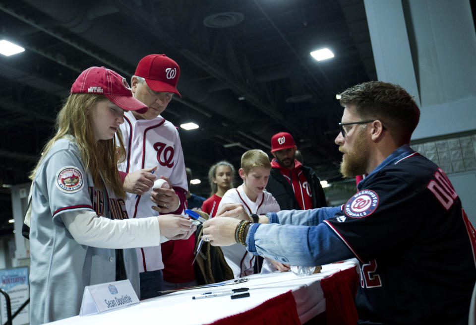 Washington Nationals pitcher Sean Doolittle and his wife Eireann Dolan are activists in the veteran and LGBT communities ( AP Photo)