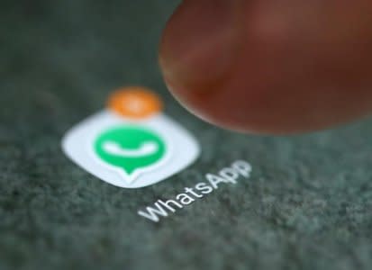 The WhatsApp app logo is seen on a smartphone in this picture illustration taken September 15, 2017. REUTERS/Dado Ruvic/Illustration