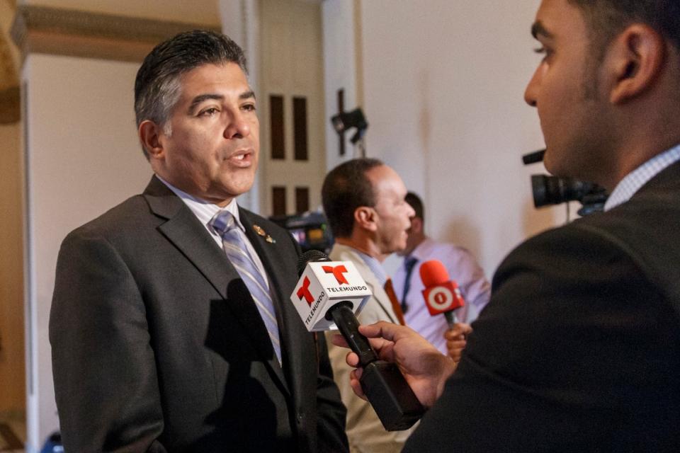 Rep. Tony Cardenas speaks with reporters on Capitol Hill in Washington.AP